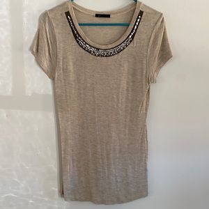Cream T-shirt top with accent on neckline